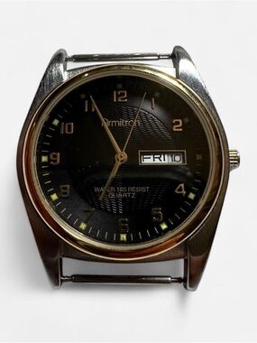 Vintage Armitron Black and Gold Men's Analog Quartz Watch with Day-Date